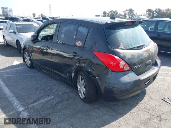 2012 Nissan Versa S with VIN 3N1BC1CP4CK203309, listed as a IAAI auction lot 41614884 with 141,770 mi miles. Bid and sale history available at carsss.com. Image 3.