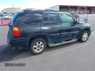 2002 GMC Envoy SLE z VIN 1GKDS13S922523317, wystawiony jako IAAI lot #42374259 z przebiegiem 185 686 mil mil oraz . Historia ofert i sprzedaży dostępna na DreamBid. Obrazek 4.