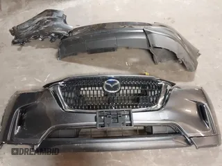 2024 Mazda CX-90 Preferred z VIN JM3KKBHAXR1161160, wystawiony jako IAAI lot #41958318 z przebiegiem 8 449 mil mil oraz . Historia ofert i sprzedaży dostępna na DreamBid. Obrazek 12.
