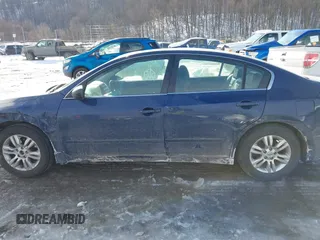2009 Nissan Altima 2.5 with VIN 1N4AL21E19N458024, listed as a IAAI auction lot 41413491 with 120,982 mi miles. Bid and sale history available at carsss.com. Image 14.