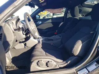 2014 Nissan 370Z Nismo z VIN JN1AZ4EHXEM632166, wystawiony jako Copart lot #88311915 z przebiegiem 18 414 mil mil oraz Szkoda całkowita • Salvage title. Historia ofert i sprzedaży dostępna na DreamBid. Obrazek 7.