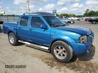 2003 Nissan Frontier XE z VIN 1N6ED27TX3C434061, wystawiony jako Copart lot #56834655 z przebiegiem 208 857 mil mil oraz Szkody całkowita. Historia ofert i sprzedaży dostępna na DreamBid. Obrazek 4.
