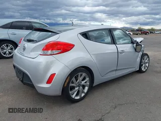 2017 Hyundai Veloster Value Edition with VIN KMHTC6AD2HU308084, listed as a IAAI auction lot 41734062 with 59,354 mi miles. Bid and sale history available at carsss.com. Image 4.