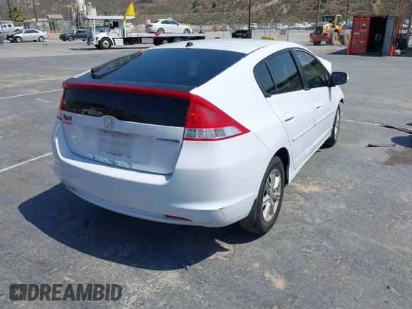 2010 Honda Insight EX with VIN JHMZE2H71AS012927, listed as a IAAI auction lot 42455037 with Not provided miles and . Bid and sale history available at DreamBid. Image 4.