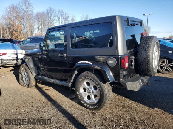 2014 Jeep Wrangler Sahara with VIN 1C4AJWBG9EL102983, listed as a Copart auction lot 84501554 with 120,372 mi miles and Salvage Title. Bid and sale history available at DreamBid. Image 2.