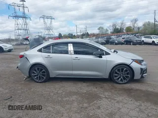 2021 Toyota Corolla SE with VIN 5YFS4MCE2MP066802, listed as a IAAI auction lot 42031552 with 34,075 mi miles. Bid and sale history available at carsss.com. Image 14.