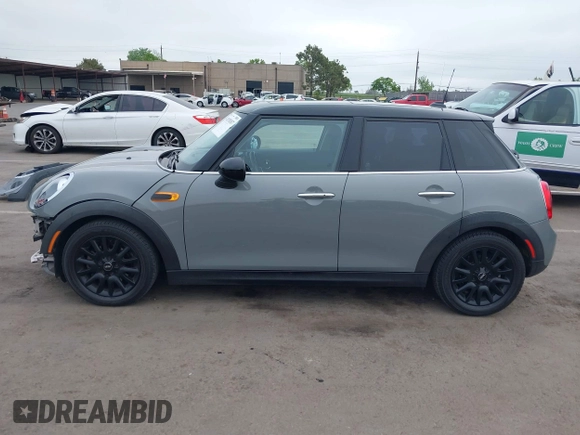2015 MINI Hardtop 4 Door with VIN WMWXS5C52FT829699, listed as a IAAI auction lot 42078187 with 59,641 mi miles and . Bid and sale history available at DreamBid. Image 15.