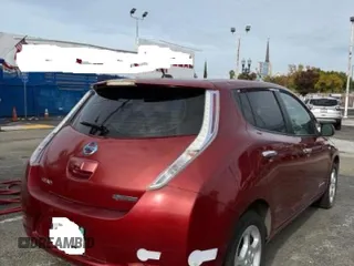 2011 Nissan LEAF SL-e with VIN JN1AZ0CP4BT000865, listed as a Copart auction lot 83054344 with 83,101 mi miles and Clean Title. Bid and sale history available at carsss.com. Image 4.