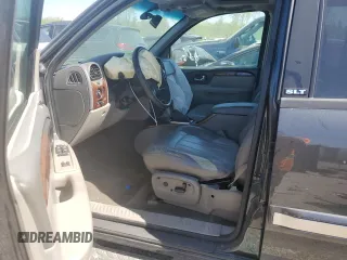 2003 GMC Envoy SLE with VIN 1GKDS13S732203933, listed as a Copart auction lot 72735604 with 0 mi miles and Clean Title. Bid and sale history available at carsss.com. Image 7.