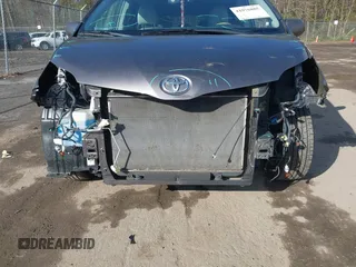 2014 Toyota Sienna XLE with VIN 5TDYK3DC5ES475750, listed as a IAAI auction lot 41976805 with 221,804 mi miles. Bid and sale history available at carsss.com. Image 6.