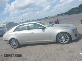 2014 Cadillac CTS Luxury RWD with VIN 1G6AR5SX1E0158438, listed as a IAAI auction lot 41801082 with 28,888 mi miles. Bid and sale history available at carsss.com. Image 13.