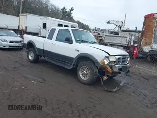 1998 Ford Ranger XL with VIN 1FTZR15X3WTA79874, listed as a IAAI auction lot 41624767 with 124,521 mi miles. Bid and sale history available at carsss.com. Image 1.