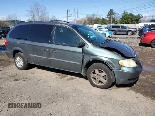 2004 Dodge Caravan SE with VIN 1D4GP24R04B520727, listed as a Copart auction lot 52002475 with 164,954 mi miles and Salvage title. Bid and sale history available at DreamBid. Image 4.