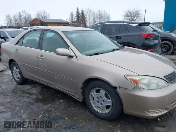 2002 Toyota Camry XLE z VIN 4T1BF32K42U533788, wystawiony jako IAAI lot #42024918 z przebiegiem 120 168 mil mil oraz . Historia ofert i sprzedaży dostępna na DreamBid. Obrazek 13.