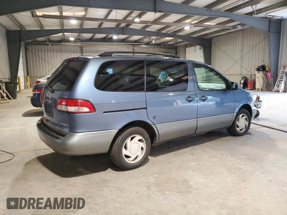 2002 Toyota Sienna LE with VIN 4T3ZF13C42U437712, listed as a Copart auction lot 64836245 with 151,693 mi miles and Salvage title. Bid and sale history available at DreamBid. Image 3.