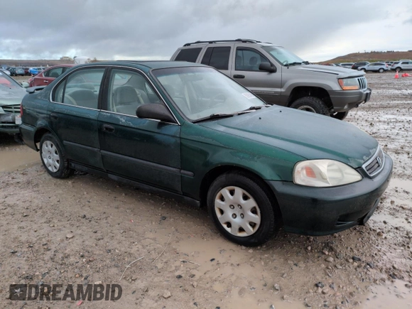 2000 Honda Civic LX with VIN 2HGEJ6676YH512977, listed as a Copart auction lot 50985455 with 242,759 mi miles and Salvage Title. Bid and sale history available at DreamBid. Image 4.