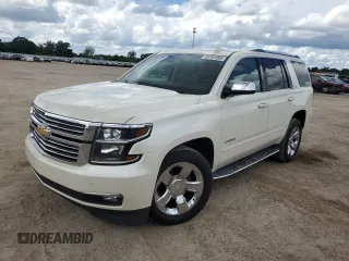 2015 Chevrolet Tahoe LTZ z VIN 1GNSCCKC0FR737641, wystawiony jako Copart lot #59797095 z przebiegiem 85 932 mil mil oraz Szkoda całkowita • Salvage title. Historia ofert i sprzedaży dostępna na DreamBid. Obrazek 1.