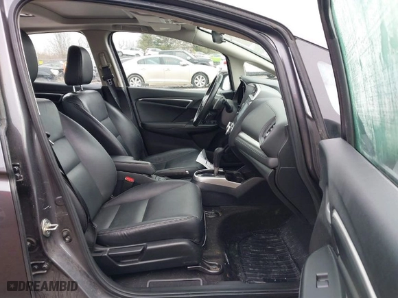2018 Honda Fit EX-L with VIN 3HGGK5H98JM723457, listed as a IAAI auction lot 41630581 with 102,164 mi miles. Bid and sale history available at carsss.com. Image 5.