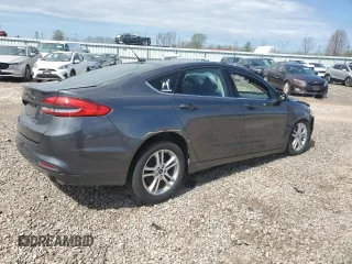 2018 Ford Fusion SE z VIN 3FA6P0H78JR108395, wystawiony jako Copart lot #55308795 z przebiegiem Nie podano mil oraz Szkoda całkowita • Salvage title. Historia ofert i sprzedaży dostępna na DreamBid. Obrazek 3.