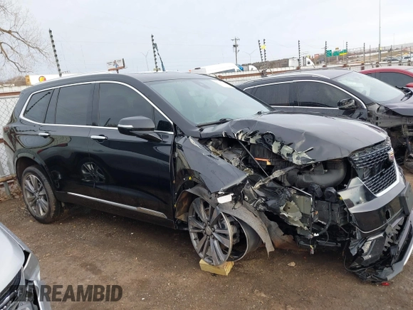 2021 Cadillac XT6 Premium Luxury z VIN 1GYKPDRS9MZ120150, wystawiony jako IAAI lot #41715368 z przebiegiem 47 835 mil mil oraz . Historia ofert i sprzedaży dostępna na DreamBid. Obrazek 14.