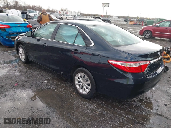 2015 Toyota Camry XLE with VIN 4T1BF1FK4FU043212, listed as a IAAI auction lot 41706573 with 170,074 mi miles and . Bid and sale history available at DreamBid. Image 3.