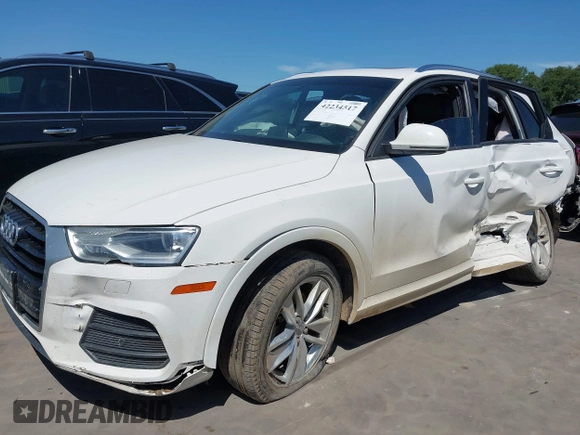 2017 Audi Q3 Premium z VIN WA1BCCFS3HR010582, wystawiony jako IAAI lot #42234517 z przebiegiem 85 880 mil mil oraz . Historia ofert i sprzedaży dostępna na DreamBid. Obrazek 17.