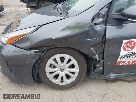 2022 Toyota Prius L Eco with VIN JTDKAMFU3N3190079, listed as a IAAI auction lot 41771356 with 52,607 mi miles and . Bid and sale history available at DreamBid. Image 6.