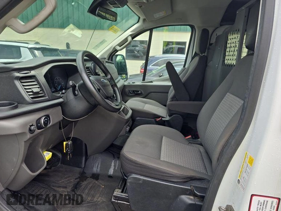 2020 Ford Transit Cargo with VIN 1FTBR1Y82LKB08403, listed as a IAAI auction lot 42279744 with 102,527 mi miles and . Bid and sale history available at DreamBid. Image 14.