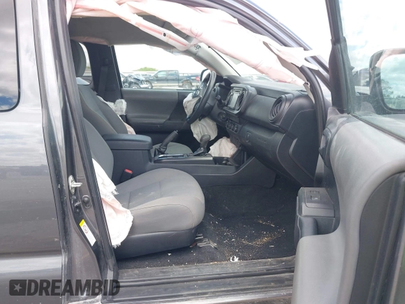 2019 Toyota Tacoma SR with VIN 5TFSX5EN4KX070181, listed as a IAAI auction lot 42318751 with 68,334 mi miles and . Bid and sale history available at DreamBid. Image 5.