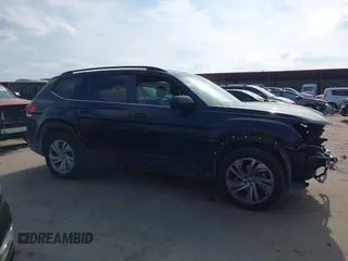 2021 Volkswagen Atlas SE z VIN 1V2HR2CA0MC543876, wystawiony jako IAAI lot #41598298 z przebiegiem 99 171 mil mil oraz . Historia ofert i sprzedaży dostępna na DreamBid. Obrazek 14.