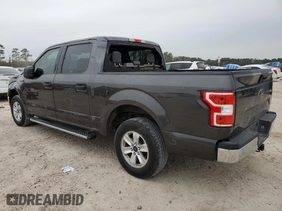 2020 Ford F-150 XL with VIN 1FTEW1CB1LKD56067, listed as a Copart auction lot 87887395 with 106,980 mi miles and Salvage Title. Bid and sale history available at carsss.com. Image 2.