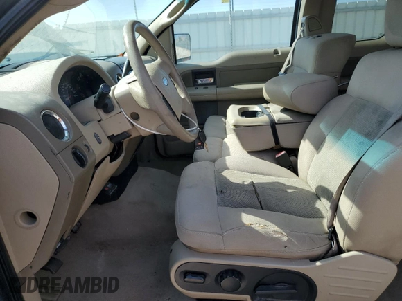 2004 Ford F-150 XLT with VIN 1FTPX14574NB17797, listed as a Copart auction lot 66909285 with 249,165 mi miles and Clean title. Bid and sale history available at DreamBid. Image 7.