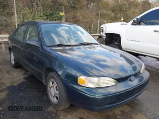 1999 Chevrolet Prizm with VIN 1Y1SK5280XZ405621, listed as a IAAI auction lot 41699756 with 179,751 mi miles. Bid and sale history available at carsss.com. Image 1.