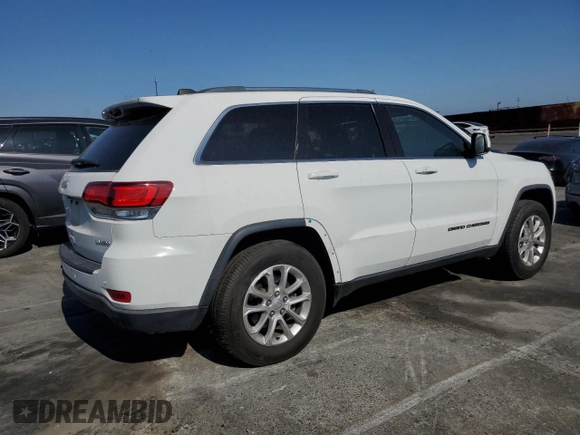 2021 Jeep Grand Cherokee Laredo E with VIN 1C4RJEAGXMC719497, listed as a Copart auction lot 60830315 with 3,873 mi miles and Salvage title. Bid and sale history available at DreamBid. Image 3.