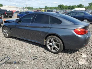 2015 BMW 4 Series 435i xDrive with VIN WBA4B3C51FGV48297, listed as a Copart auction lot 60950394 with 105,509 mi miles and Salvage Title. Bid and sale history available at DreamBid. Image 2.