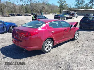 2013 Kia Optima EX with VIN 5XXGN4A70DG242438, listed as a IAAI auction lot 41812356 with 105,000 mi miles. Bid and sale history available at carsss.com. Image 4.