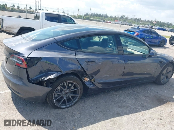 2023 Tesla Model 3 with VIN 5YJ3E1EA3PF623114, listed as a IAAI auction lot 41710385 with 31,663 mi miles and . Bid and sale history available at carsss.com. Image 6.