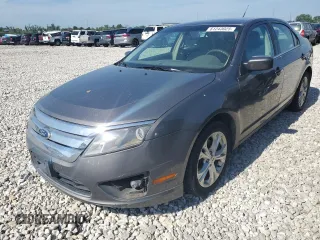 2012 Ford Fusion SE with VIN 3FAHP0HA1CR235996, listed as a Copart auction lot 61243025 with 165,218 mi miles and Salvage title. Bid and sale history available at DreamBid. Image 1.