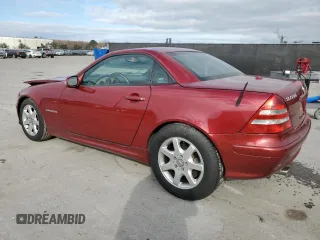 2001 Mercedes-Benz SLK 230 Kompressor with VIN WDBKK49F01F223928, listed as a Copart auction lot 87061404 with 102,270 mi miles and Salvage title. Bid and sale history available at DreamBid. Image 2.