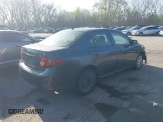 2009 Toyota Corolla with VIN JTDBL40E499083055, listed as a IAAI auction lot 41918173 with 223,308 mi miles. Bid and sale history available at carsss.com. Image 4.