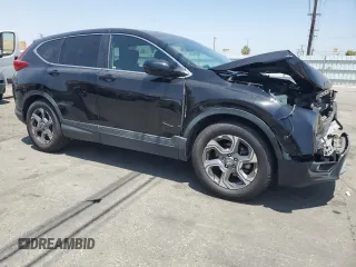 2019 Honda CR-V EX with VIN 5J6RW1H55KA047950, listed as a Copart auction lot 61030775 with 69,817 mi miles and Salvage title. Bid and sale history available at DreamBid. Image 4.