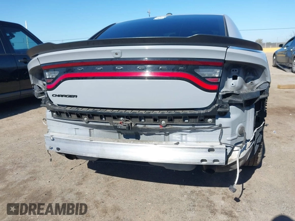 2022 Dodge Charger SXT with VIN 2C3CDXBG3NH231325, listed as a IAAI auction lot 41667810 with 74,967 mi miles and . Bid and sale history available at DreamBid. Image 6.
