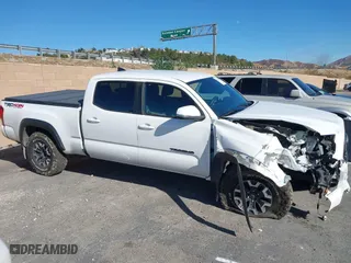 2019 Toyota Tacoma 4WD SR5 with VIN 3TMDZ5BN1KM079305, listed as a IAAI auction lot 41247804 with 98,494 mi miles. Bid and sale history available at carsss.com. Image 13.