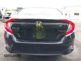 2016 Honda Civic Sedan LX with VIN 19XFC2F58GE098941, listed as a IAAI auction lot 42027734 with 155,677 mi miles. Bid and sale history available at carsss.com. Image 17.