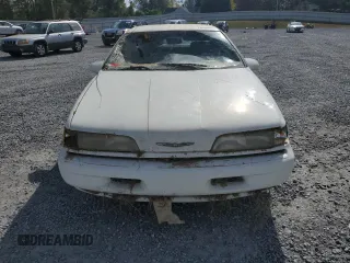 1993 Ford Thunderbird LX z VIN 1FAPP62T6PH189176, wystawiony jako Copart lot #78146094 z przebiegiem 107 514 mil mil oraz Szkoda całkowita • Salvage title. Historia ofert i sprzedaży dostępna na DreamBid. Obrazek 5.