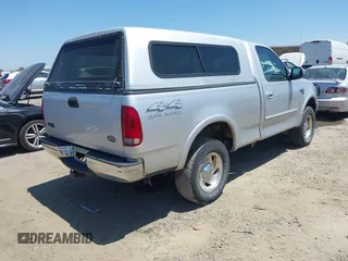 2000 Ford F-150 XL z VIN 1FTRF18L1YKA63179, wystawiony jako IAAI lot #42532771 z przebiegiem 116 604 mil mil oraz . Historia ofert i sprzedaży dostępna na DreamBid. Obrazek 4.