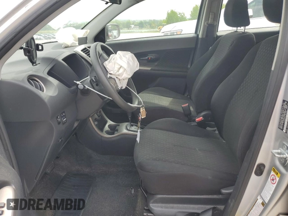 2012 Scion xD with VIN JTKKU4B46C1020748, listed as a Copart auction lot 58634835 with 141,876 mi miles and Salvage title. Bid and sale history available at DreamBid. Image 7.