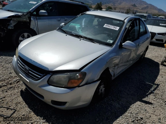 2009 Kia Spectra EX with VIN KNAFE222595663938, listed as a Copart auction lot 69422764 with 251,066 mi miles and Salvage Title. Bid and sale history available at carsss.com. Image 1.