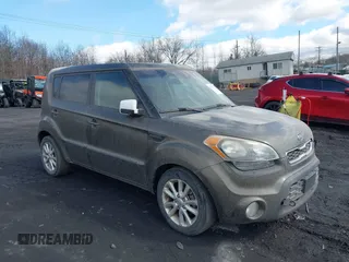 2012 Kia Soul + with VIN KNDJT2A60C7392564, listed as a IAAI auction lot 41702795 with 147,282 mi miles. Bid and sale history available at carsss.com. Image 1.