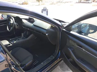 2021 Mazda 3 S with VIN JM1BPAALXM1326956, listed as a IAAI auction lot 42304248 with 55,104 mi miles and . Bid and sale history available at DreamBid. Image 5.
